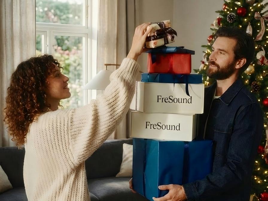 FreSound Open-Ear Technology Earbuds worn by a user, showcasing the comfortable, pressure-free fit and innovative design—the perfect audio tech gift for Christmas.