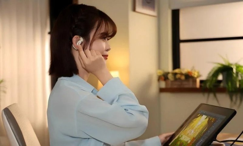 wear open earbuds while digital drawing